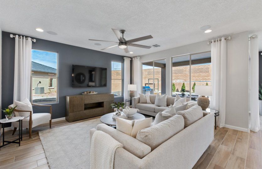 Gathering room with bright windows to bring in natural lighting.