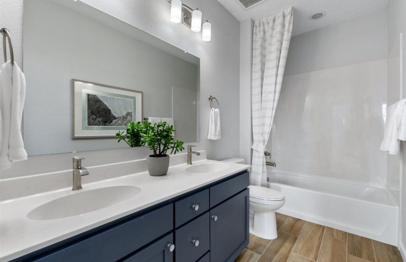 Bathroom 2 on the second floor serves the secondary bedrooms and can be enhanced with a second sink.