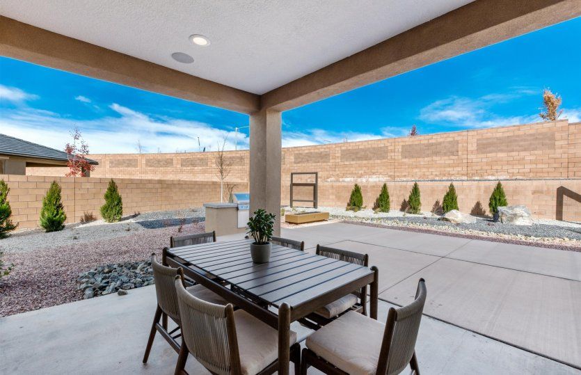 Your backyard and covered patio are home to future summer BBQ's and dining al fresco.