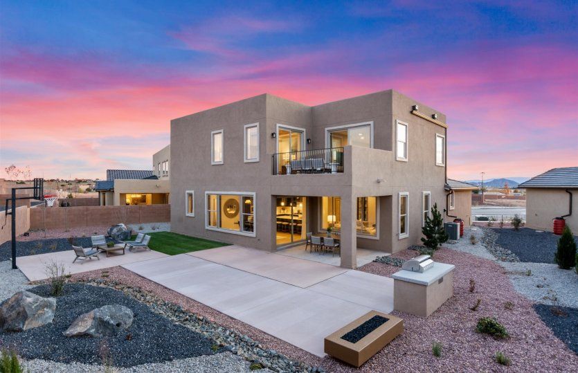 Beautiful backyard and covered patio perfect for enjoying New Mexico sunsets.