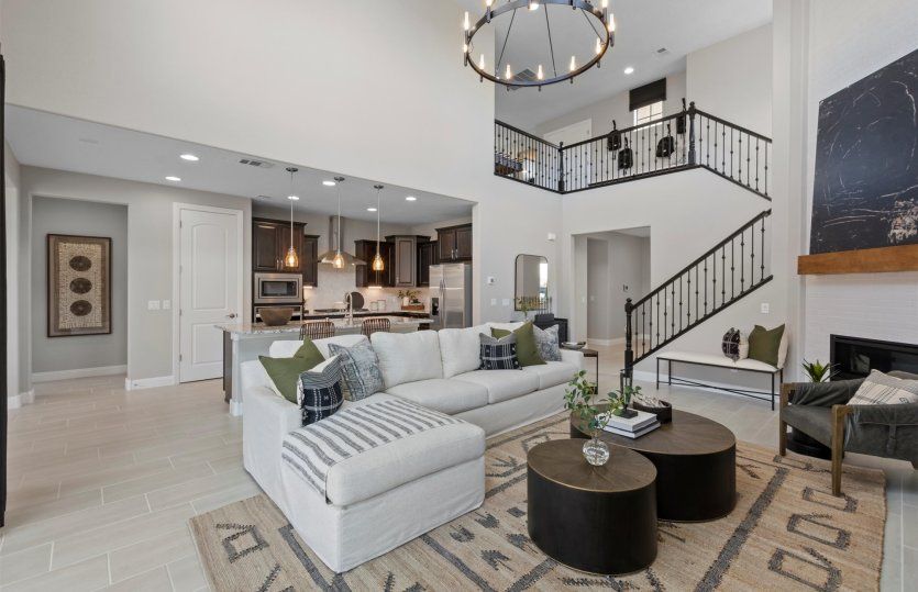 The Prato home design impresses with soaring ceilings in the gathering room that is open to the kitc