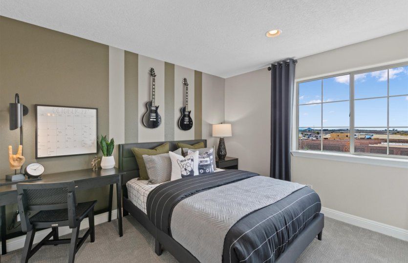 Bedroom 4 offers a walk-in closet and offers close access to another bathroom upstairs.