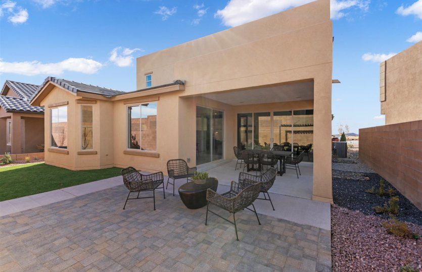 The spacious backyard is perfectly suited for hosting gatherings with friends and family.