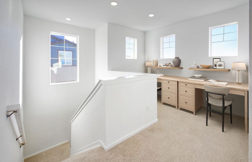 Head upstairs to find a quaint loft that's perfect for an additional office space!