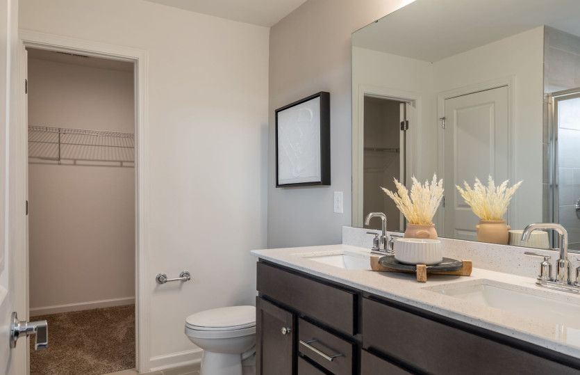 Owner's Bath with Walk-in Shower, Double Bowl Vanity and Linen Closet