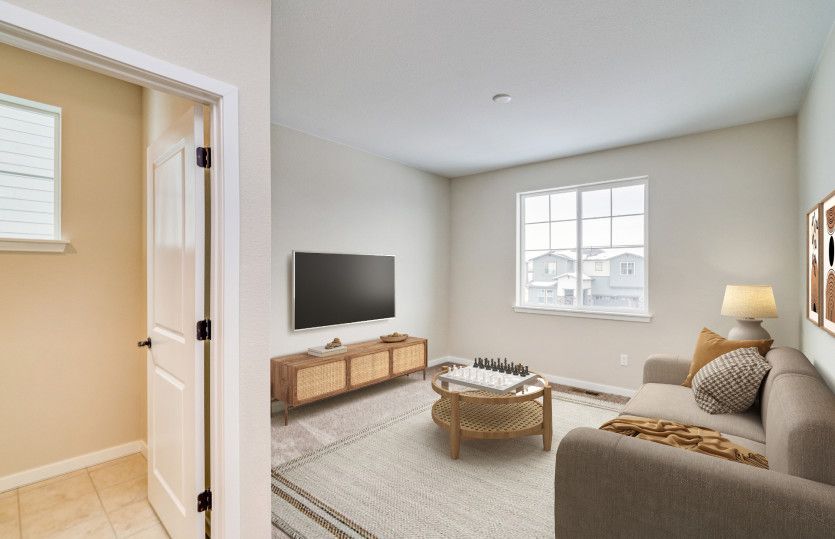 Head upstairs to find a quaint loft that can be utilized as a game room, secondary living space, and