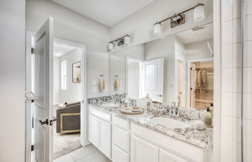 The owner's bath features a dual sink vanity to make getting ready each morning a breeze.