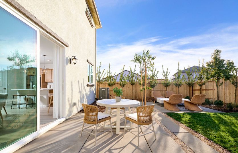Back patio offering indoor/outdoor living
