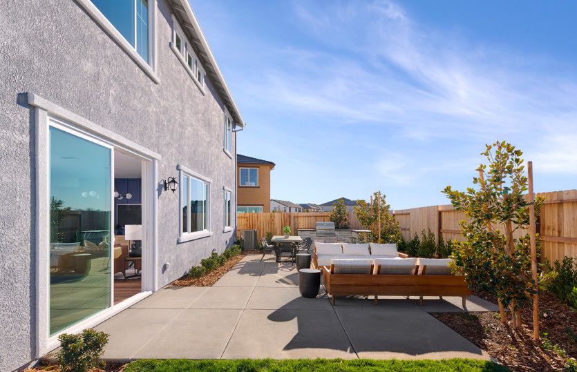 Back patio offering indoor/outdoor living