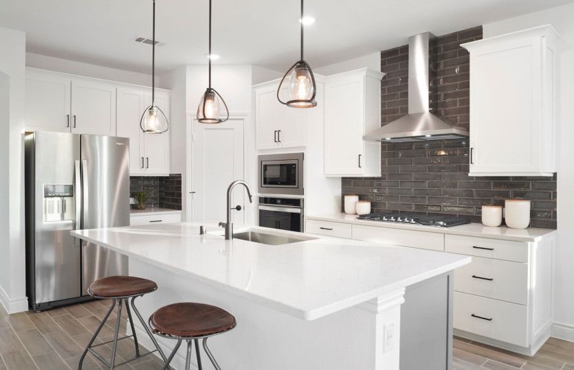 Bright and Open Kitchen with Built In Appliances