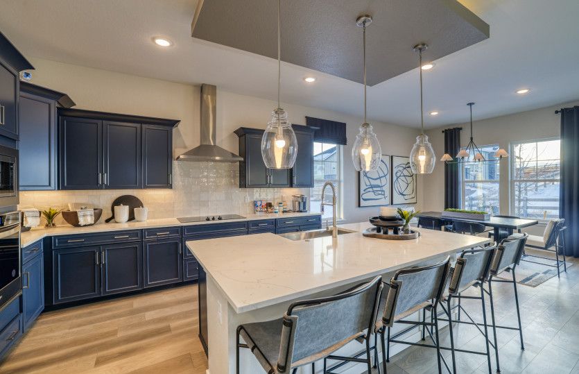 The Easton kitchen boasts ample storage and stainless steel, built-in appliances.