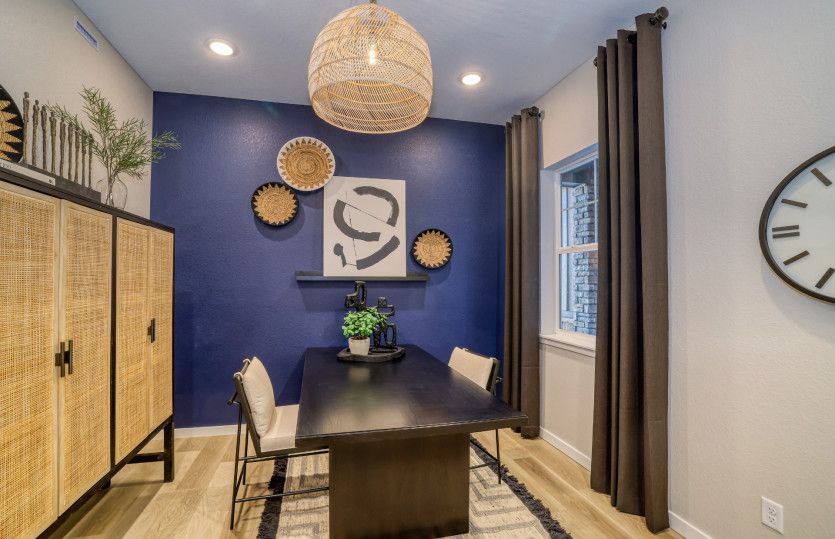 Off the entrance you'll find a spacious den perfect for an at home office.