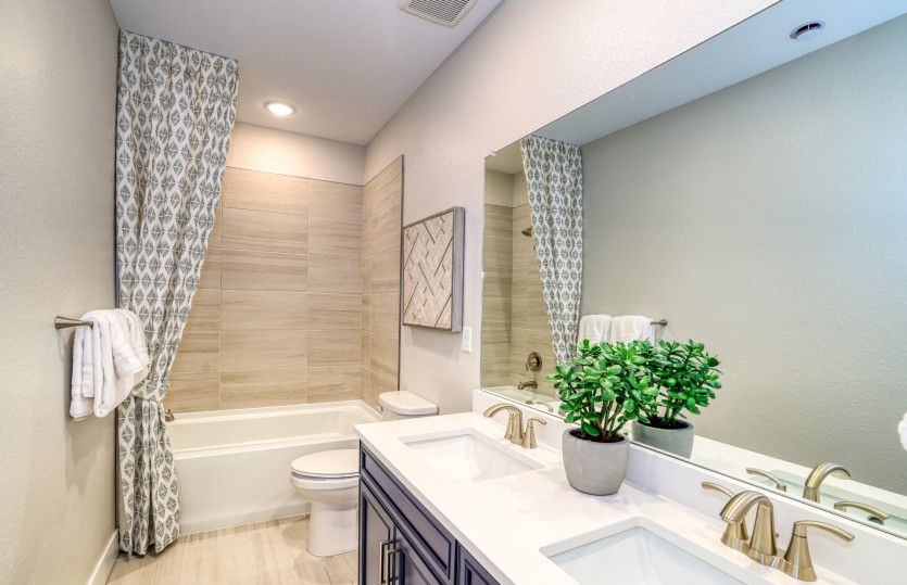 The basement bathroom boats a full shower/tub combo.