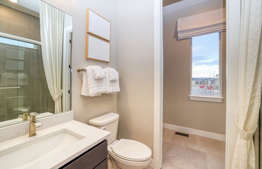 This bathroom is shown with a functional walk-in shower.