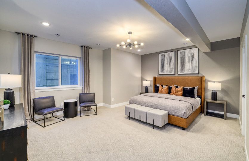 The spacious basement bedroom is the perfect place to host overnight guests.