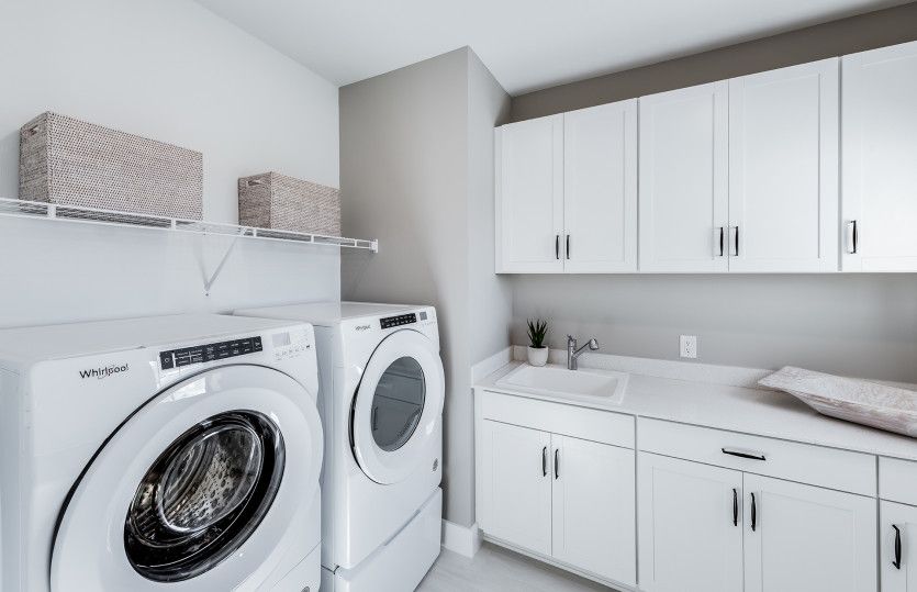 Large laundry room with ample storage