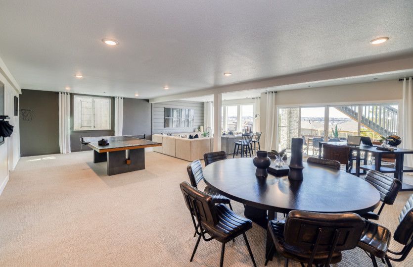The finished basement option adds a spacious game room and an additional bedroom.