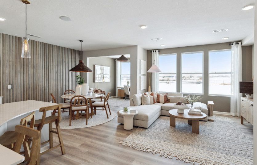 Gazing into the sunroom, dining room, and gathering room