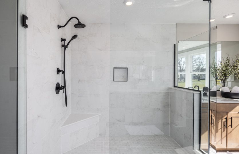 Sleek Owner's Suite Shower