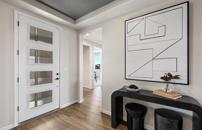 Enter the Parklane model home to a welcoming foyer.