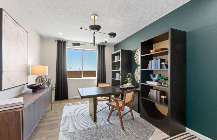 Continue on through the Parklane to find a spacious den, perfect for an at home office!