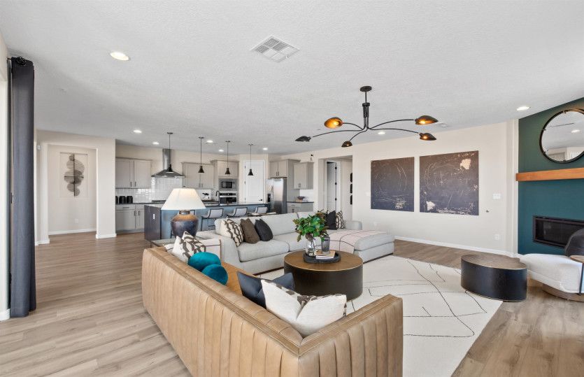 The Parklane features an open floor plan that seamlessly connects the main living areas of the house