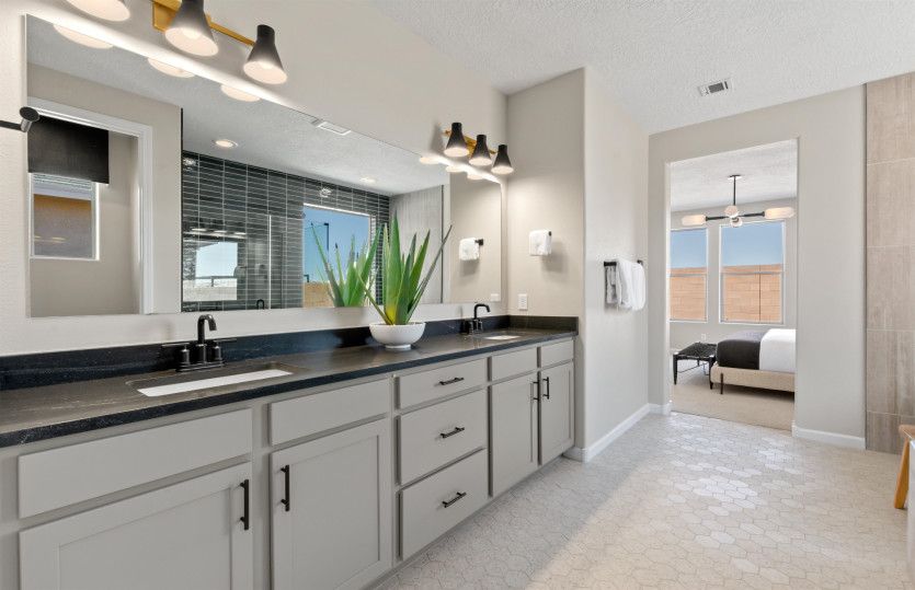 The private owner's bath makes getting ready each morning a breeze with the dual sink vanity.