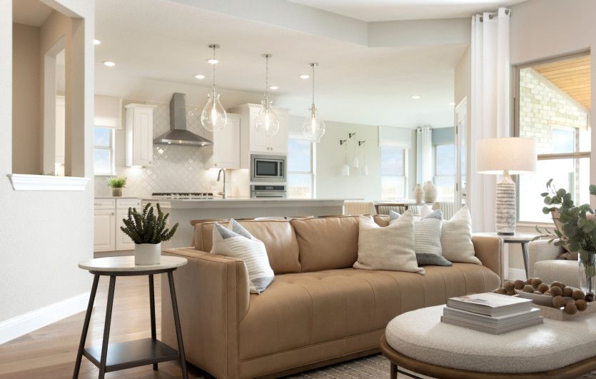 Open-Concept Gathering Room with Backyard Patio Views