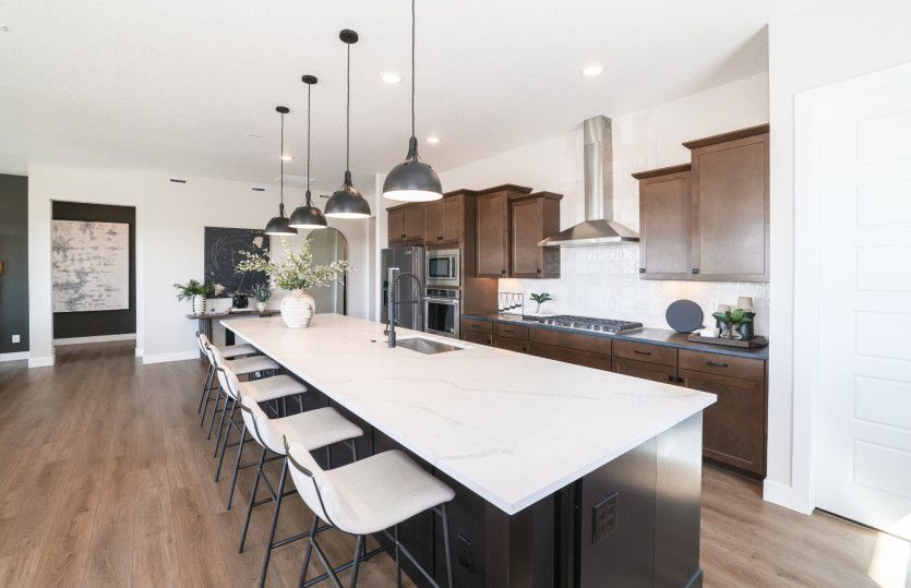 Our upgraded chef kitchen layout features built-in, stainless-steel appliances.