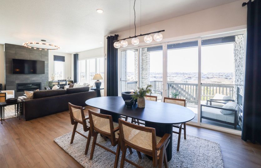 The quaint café located directly off the kitchen is brightly illuminated with natural light.