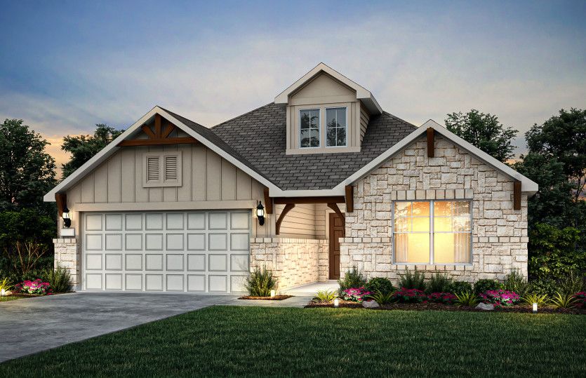 Exterior M with stone accents and a 2-car garage