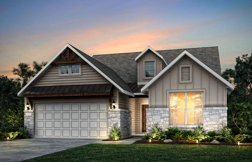 Exterior L with stone and a 2-car garage with storage space