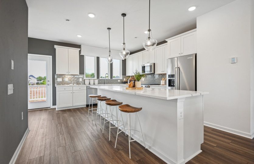 Kitchen with an Oversized Island and Stainless Steel Appliances