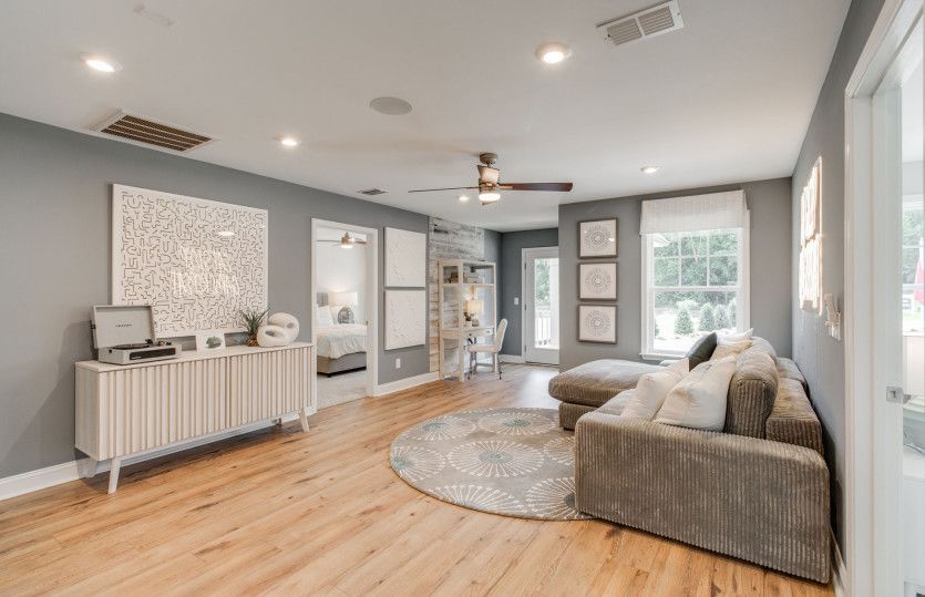 Multi-purpose loft area acts as an entertainers delight or lounge space.