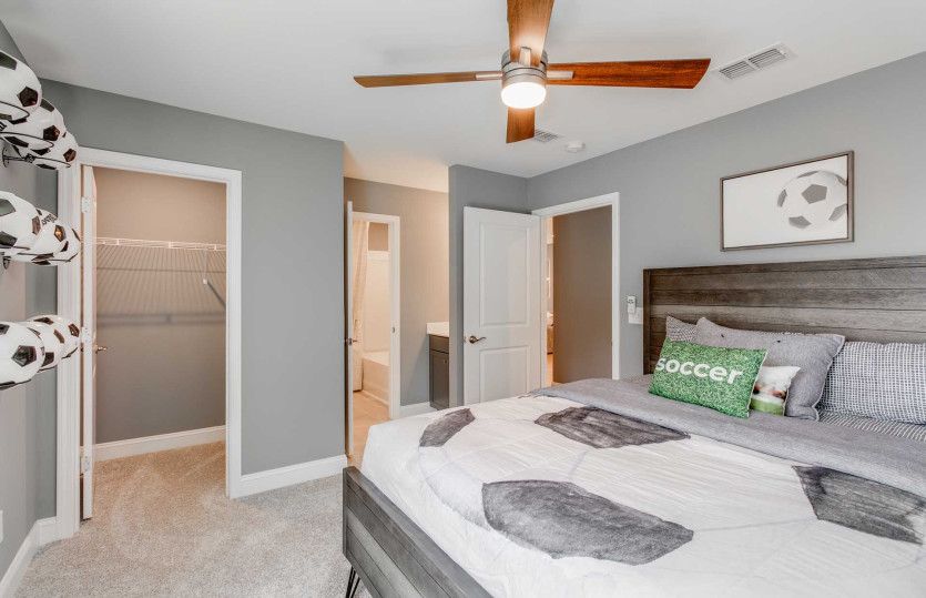 Spacious secondary bedroom with a walk-in closet.