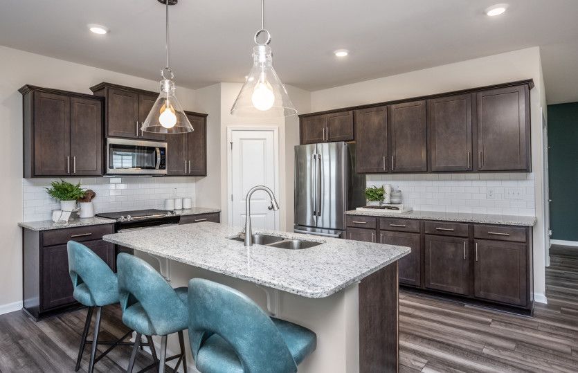 Extra Seating at the Island keeps the Cook Connected - Model Representation
