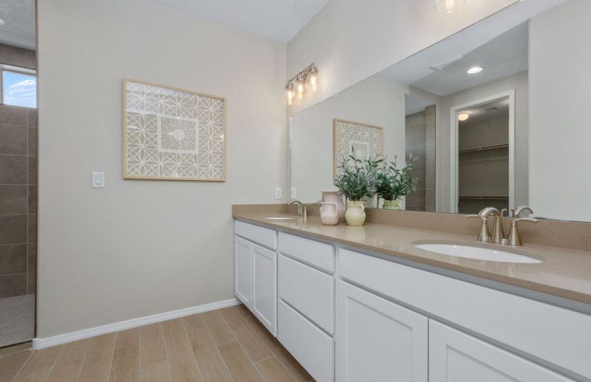 The private owner's bath makes getting ready each morning a breeze with the dual sink vanity.