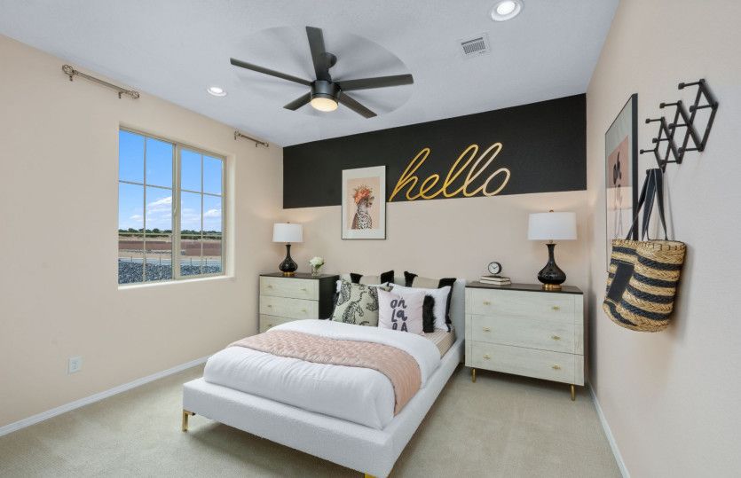 Upstairs bedroom 2 is spacious and feaures its own walk-in closet.