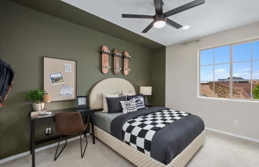 Upstairs bedroom 2 is spacious and feaures its own walk-in closet.