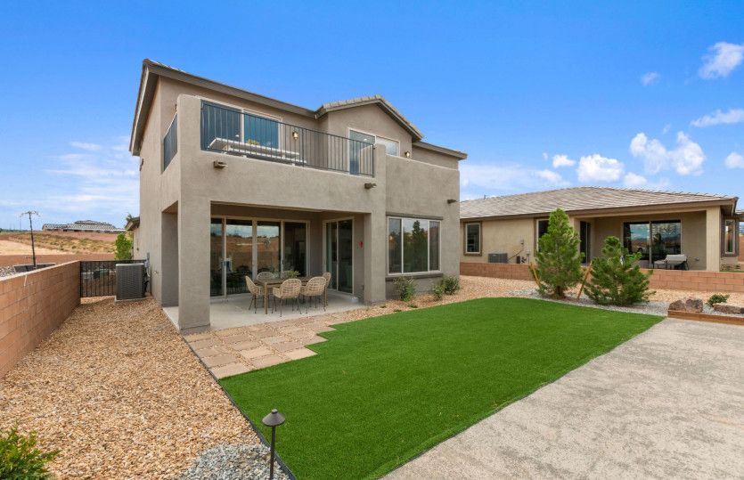 The spacious backyard is perfectly suited for hosting gatherings with friends and family.