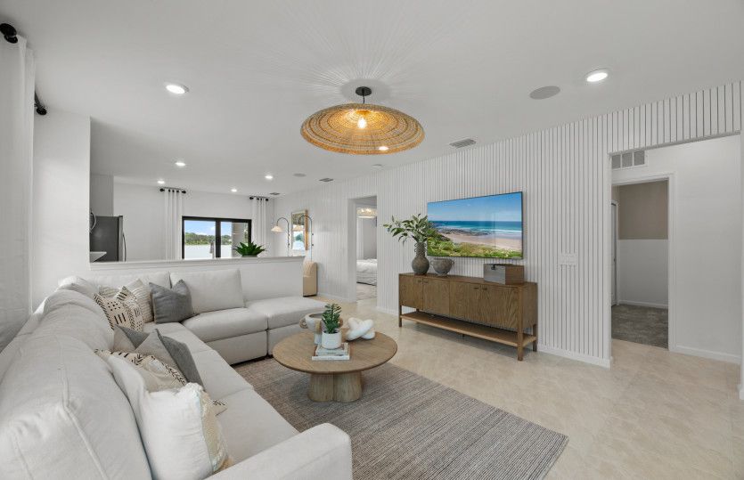 Spacious gathering room flowing into the kitchen and café area