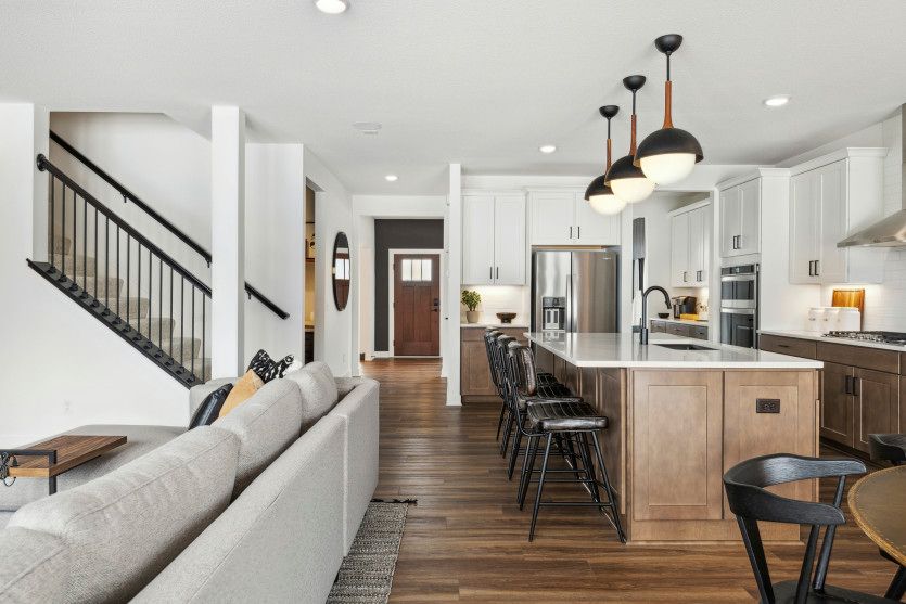 Looking back into the kitchen and foyer.
