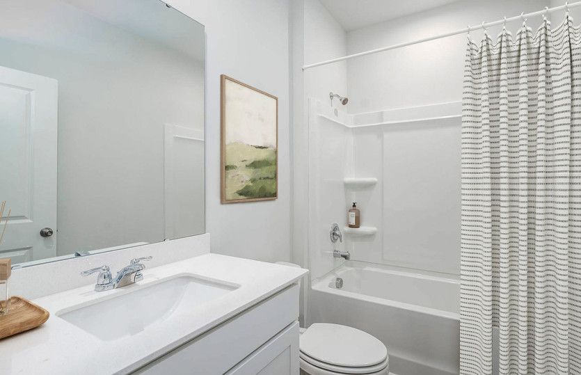 Soak in the tub and store your favorite products on the built in shelves for convenience.