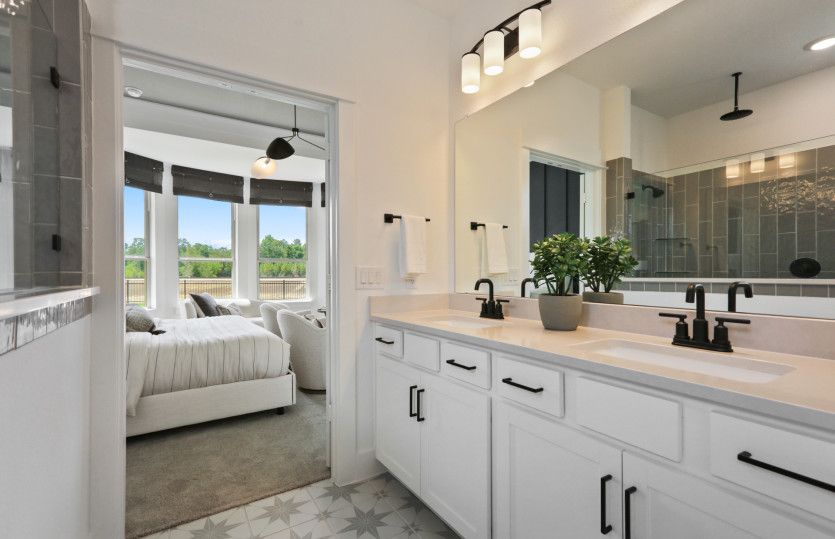 Owner's Bathroom with Double Vanity Sinks