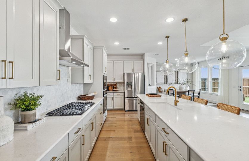 Recessed lighting in kitchen and views of cafe area*model representation