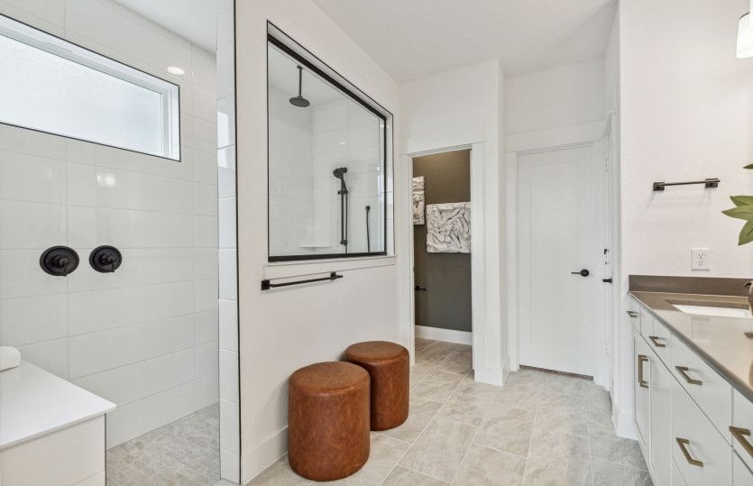 Large, walk-in shower in owner's bath*model representation