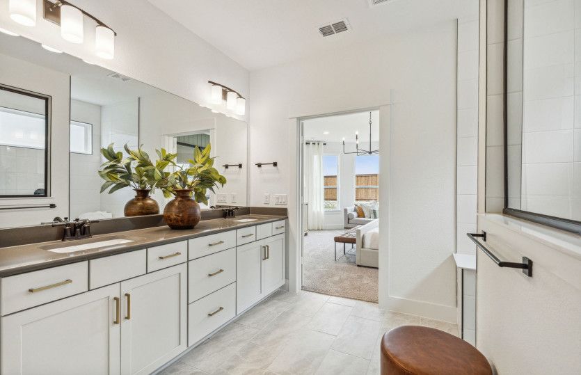 Spacious owner's bath*model representation