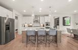 Home in Woodlands of Lyon by Pulte Homes