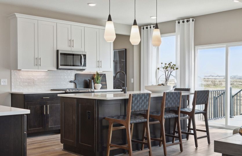 A chef-inspired kitchen with a spacious island at its heart.