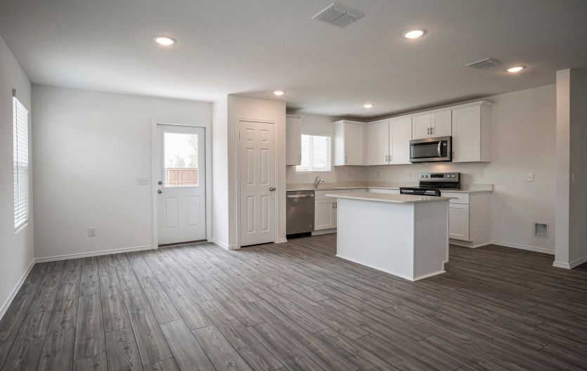 View of dining and kitchen areas
